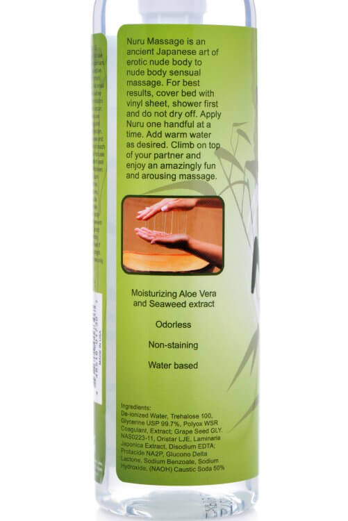 Backside of the packaging includes more details about the Nuru Couple's Body Massage Gel. Text includes "Nuru Massage is an ancient Japanese art of erotic nude body to nude body sensual massage. For best results, cover bed with vinyl sheet, shower first, and do not dry off. Apply Nuru one handful at a time. Add warm water as desired. Climb on top of your partner and enjoy an amazingly fun and arousing massage."" | Kinkly Shop