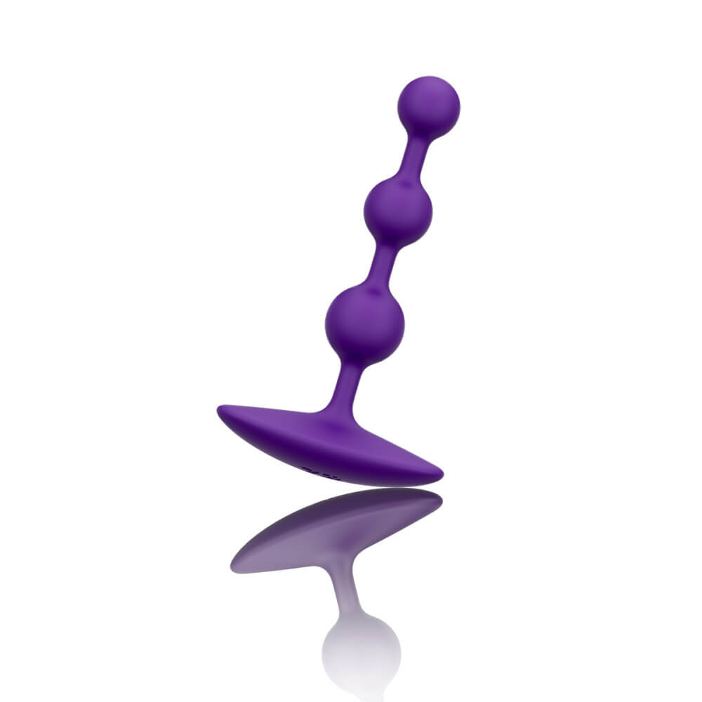 A side view of the ROMP Amp. This angle showcases how wide and secure the base of the plug is compared to the anal beads. | Kinkly Shop
