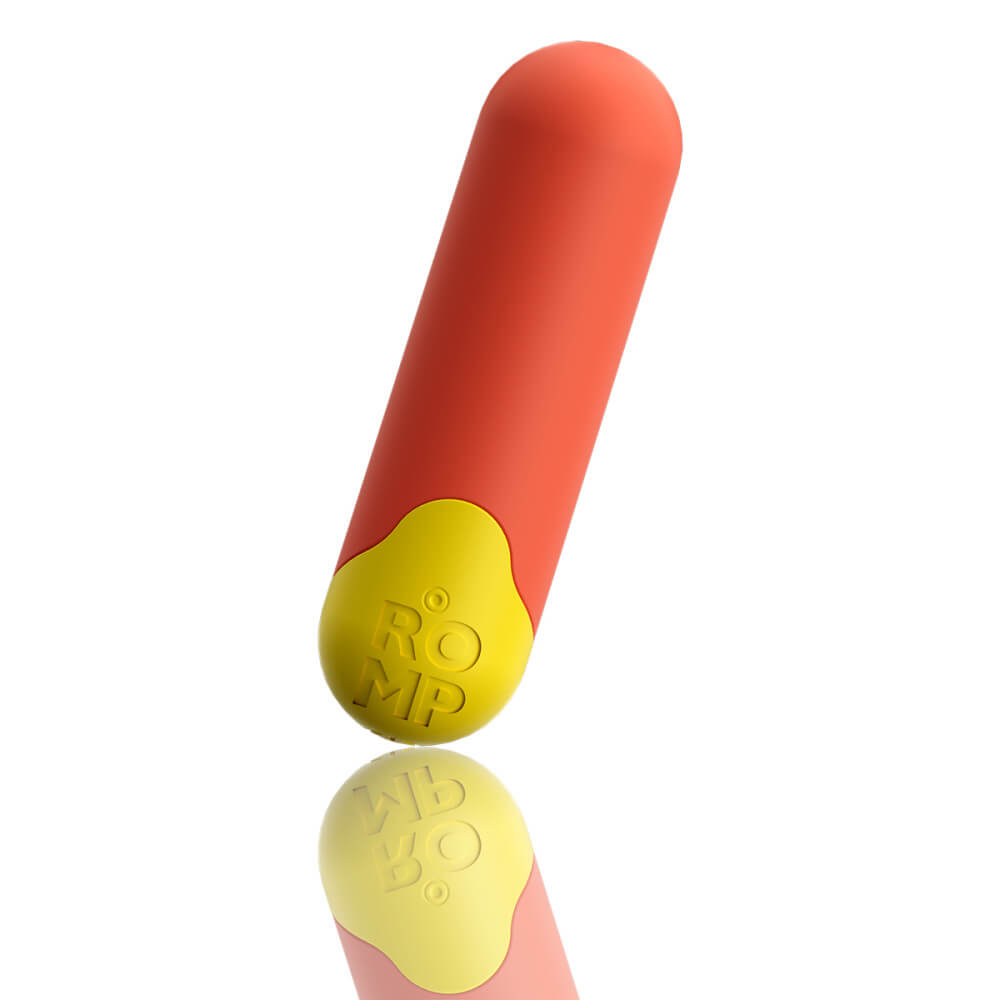 The ROMP Riot bullet vibrator with a close-up focus on the base of the vibrator. The ROMP logo is etched into the base of the vibrator and showcases the hole for the charging cable. | Kinkly Shop