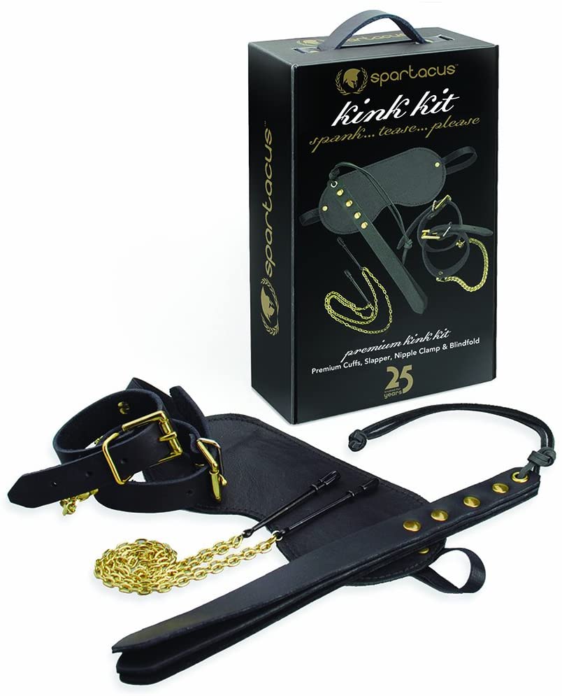 All of the pieces of the Spartacus Kink Kit sitting out in front of the packaging for the Spartacus Kink Kit. | Kinkly Shop