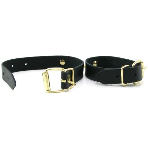 The two included cuffs within the Spartacus Kink Kit. It shows that they use standard belt buckles for fastening. | Kinkly Shop