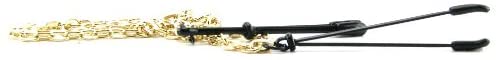 Nipple clamps included within the Spartacus Kink Kit. The image shows that the nipple clamp tips are softened with rubber tips and are black, tweezer-style clamps. The clamps are attached together by a gold chain. | Kinkly Shop