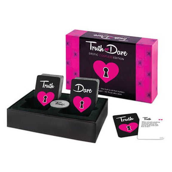 Everything included in the Truth or Dare game sitting out on a tray in front of the open box. | Kinkly Shop