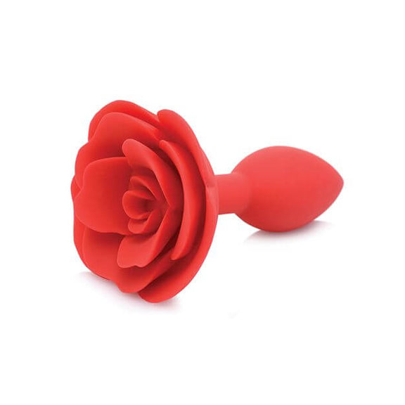 A 3/4ths view of the Master Series Booty Bloom. This showcases the shallow retention area, rounded plug with tapered tip, and a rose-like base. | Kinkly Shop
