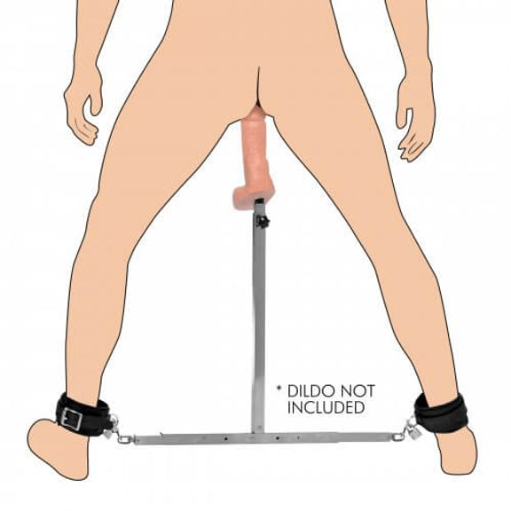 An illustrated design shows how the Master Series Squat Impaler functions. The person's ankles are separated by the metal bar while a protruding, vertical metal bar ends up between the person's legs. This protruding metal bar shows a dildo attached to it. The image has a disclaimer that states "dildo not included". | Kinkly Shop