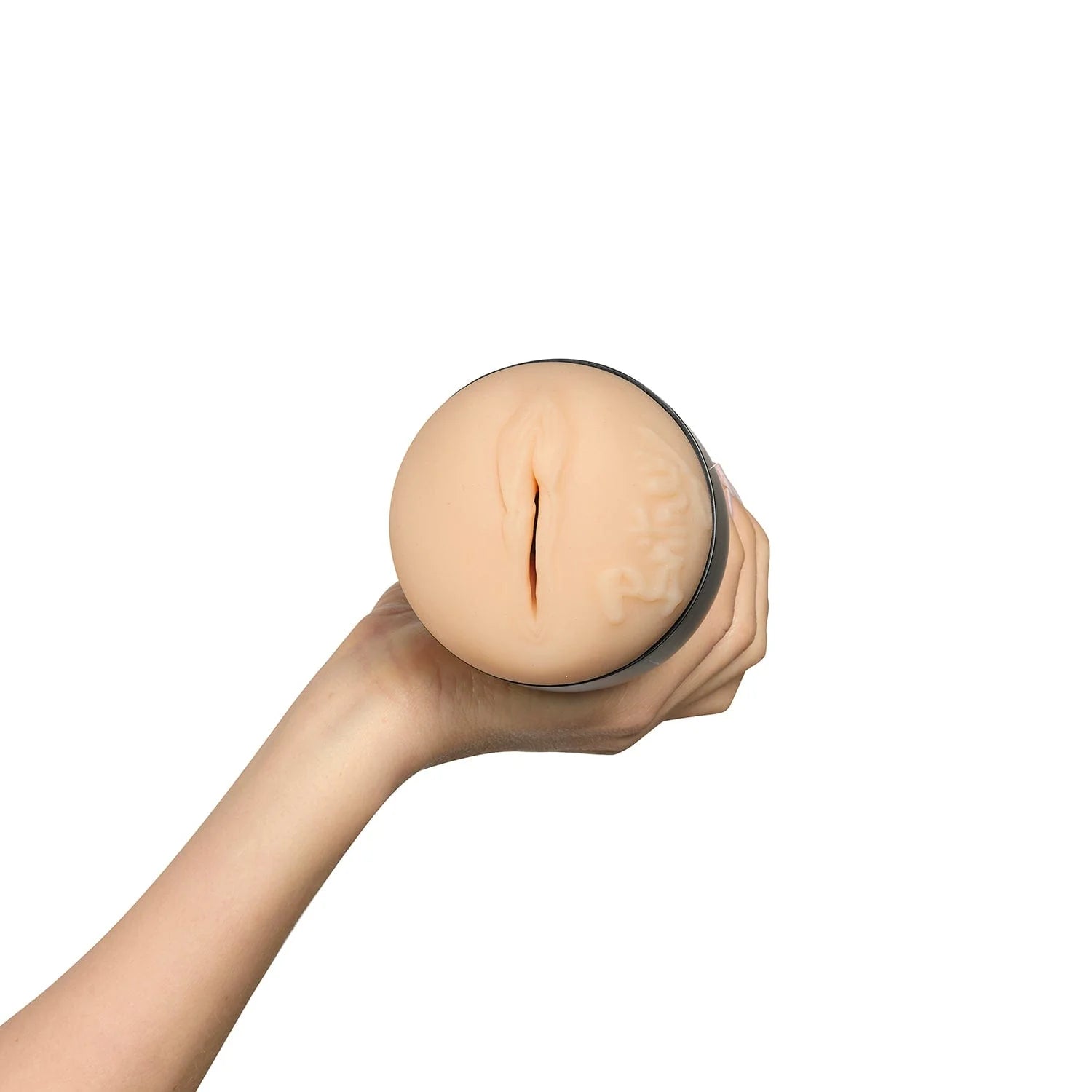 A hand holds the FeelStars FeelBritney Stroker with the orifice towards the camera. | Kinkly Shop