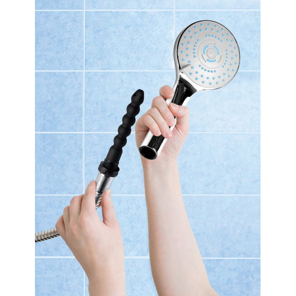 A hand holds the enema bulb and the showerhead that fits overtop of the enema tip to hide it when it's not in use. | Kinkly Shop