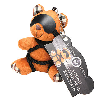 The Master Series Bound Teddy Bear Keychain with its packaging | Kinkly Shop