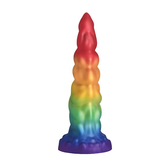 Creature Cocks Magic Rider in front of a plain white background. The dildo is an ombre of rainbow colors all the way up the shaft. | Kinkly Shop