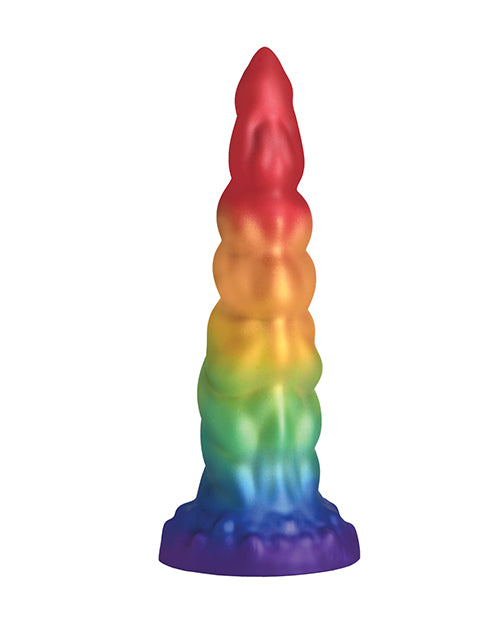 Creature Cocks Magic Rider in front of a plain white background. The dildo is an ombre of rainbow colors all the way up the shaft. | Kinkly Shop