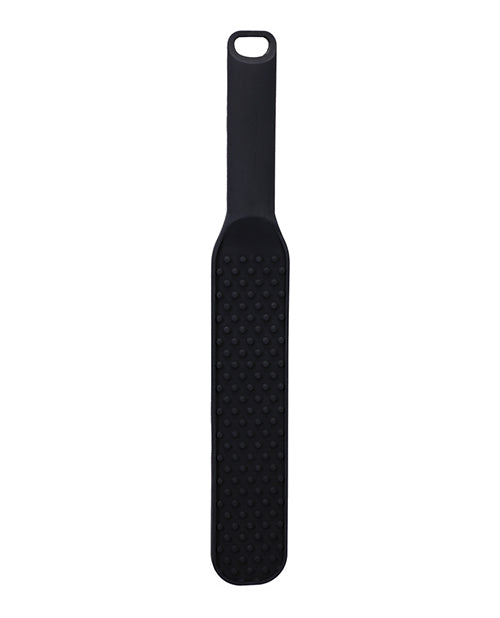 The In A Bag Spanking Paddle in front of a plain white background. There are raised bumps all along the spanking surface of the paddle to add intensity. | Kinkly Shop