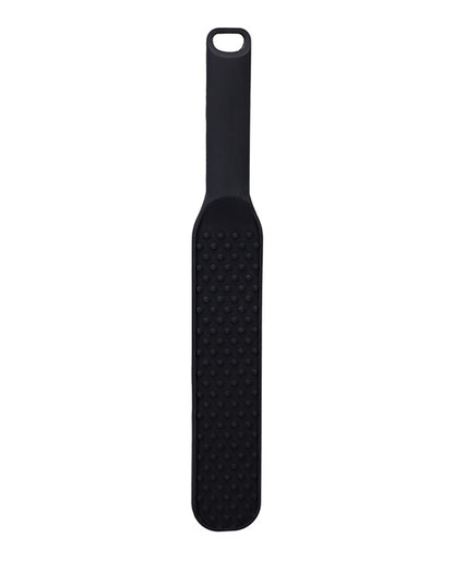 The In A Bag Spanking Paddle in front of a plain white background. There are raised bumps all along the spanking surface of the paddle to add intensity. | Kinkly Shop