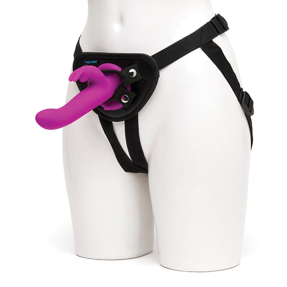 A person wears the included strap-on harness with the rabbit vibrator strapped into it from the Happy Rabbit Strap On Harness Set | Kinkly Shop