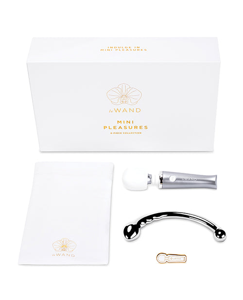 Everything included in th Le Wand Mini Pleasures Kit laying flat in front of the packaging it comes in. It's a nice, rectangular box for easy gift-giving. | Kinkly Shop