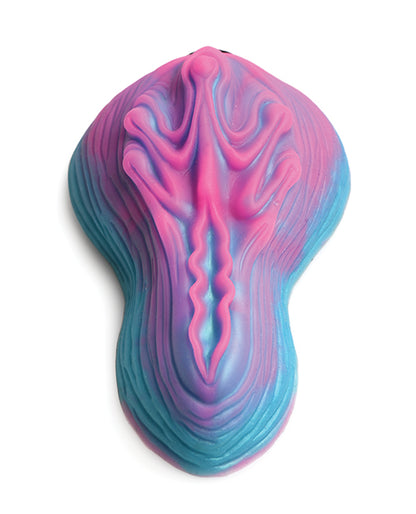 Top-down view of the Creature Cocks Vulvaron Remote-Control Vibrating Grinder. The Grinder has a very interesting texture throughout the sides and the top of the toy. | Kinkly Shop