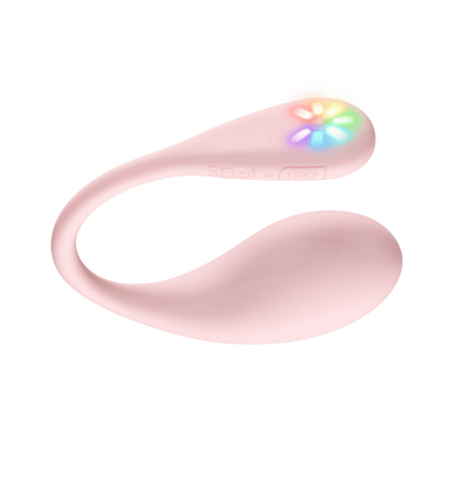KIIROO Spot in front of a plain white background. The vibrator has an egg-shaped design with a long, thin tail. On the end of the tail is a sunflower-esque design of multiple LED color lights. | Kinkly Shop