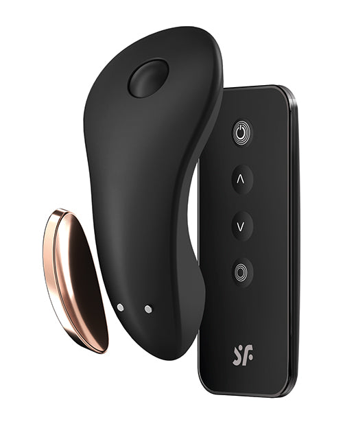 The Satisfyer Little Secret shown next to the physical remote and the magnetic panty clip that it comes with | Kinkly
