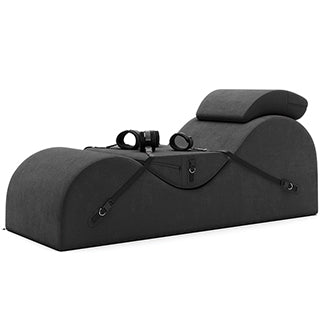 Liberator Esse Valkyrie chaise in black with headrest, cuffs, and restraint straps, ideal bondage bench for BDSM dungeon setups