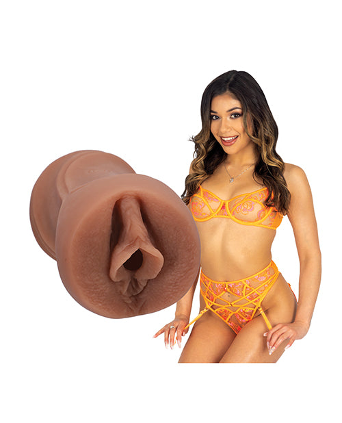 The porn star is staring at the camera while wearing lingerie. The Signature Strokers - Xxlayna Marie stroker is shown next to the porn star. | Kinkly Shop