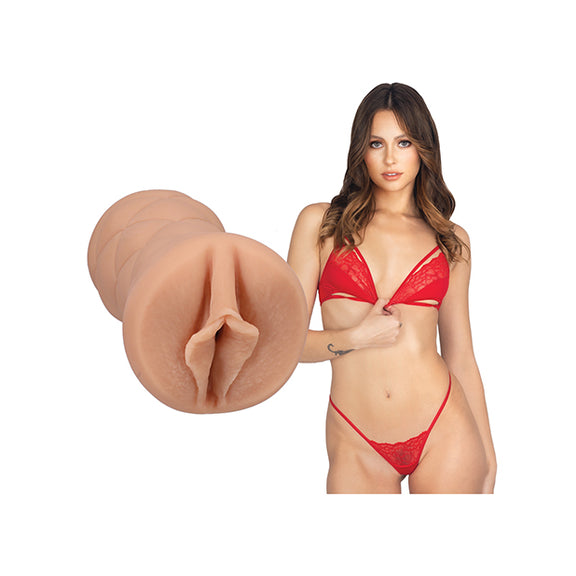Stella Barey is staring into the camera while wearing lingerie. The Signature Strokers - Stella Barey stroker is next to the porn star. | Kinkly Shop