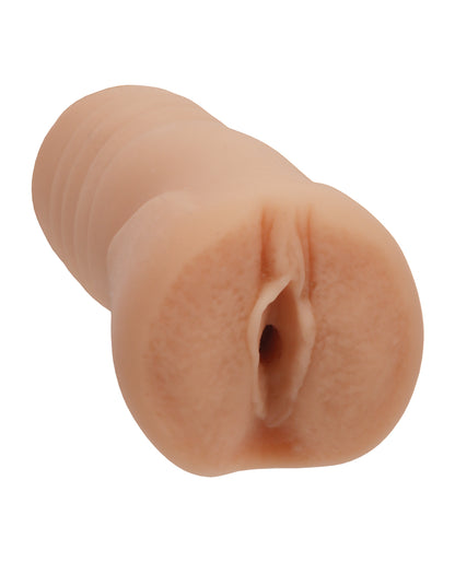 Close-up of the orifice and entrance of the Signature Strokers Blair Williams stroker. The stroker's entrance is molded from the porn star's vulva. | Kinkly Shop