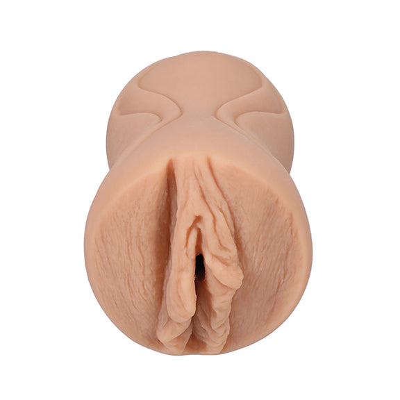 Close-up of the orifice and entrance of the Signature Strokers Kylie Rocket stroker. The stroker's entrance is molded after the porn star's vulva. | Kinkly Shop