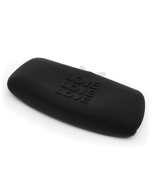 The Love Medium Silicone Storage Bag lays flat. Nothing is inside of it, and the silicone material is caving in on itself. | Kinkly Shop