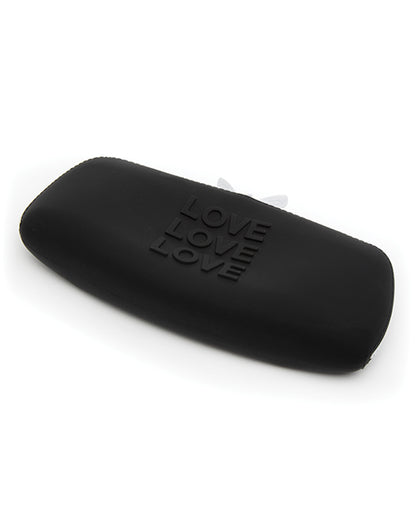 The Love Medium Silicone Storage Bag lays flat. Nothing is inside of it, and the silicone material is caving in on itself. | Kinkly Shop