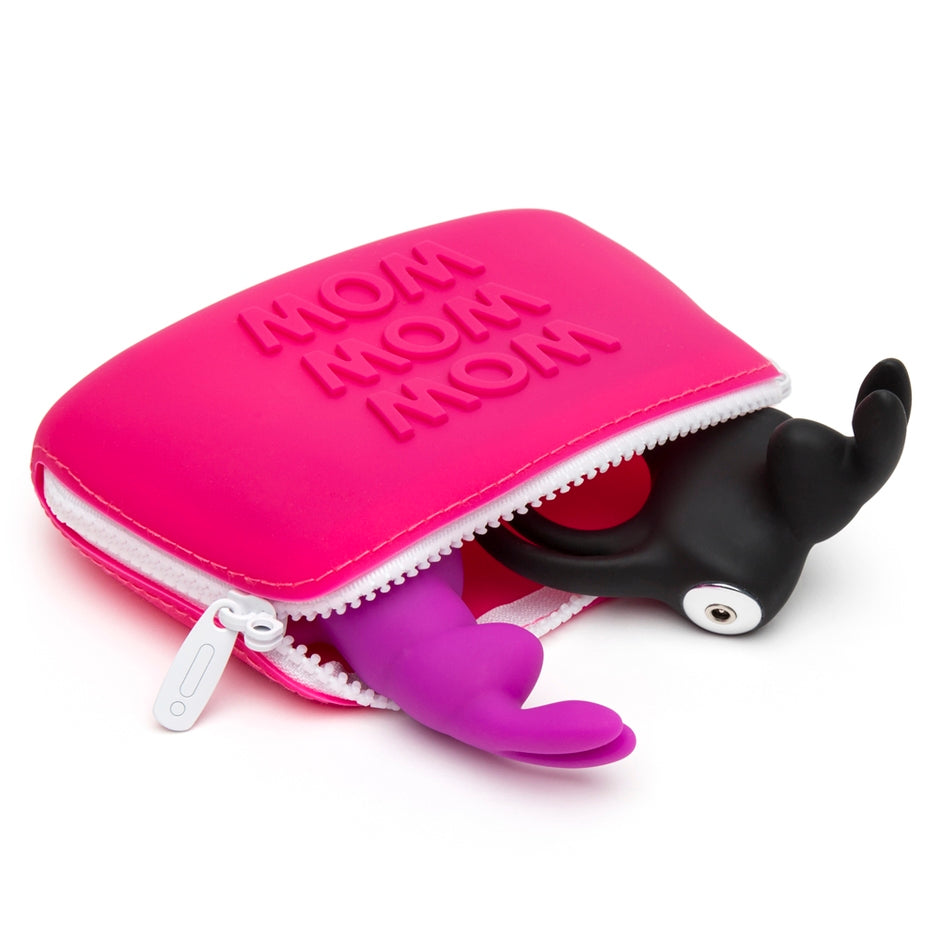 Two cock rings spill out of a Wow Small Silicone Storage Bag that's lying on its side. The bag looks barely large enough to fit the two cock rings. | Kinkly Shop