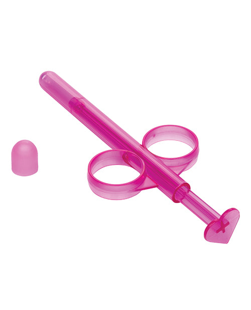 The Lube Tube sitting out, zoomed in on the base of the Lube Tube to showcase the heart-shaped plunger. | Kinkly Shop