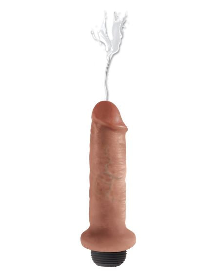 The King Cock 6" Squirting in Tan shown squirting out the tip of the dildo. | Kinkly Shop