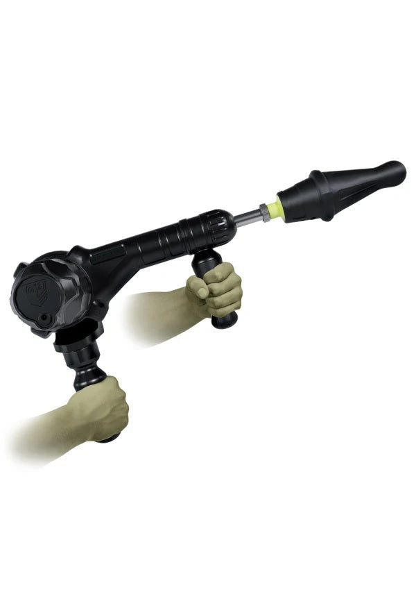Two hands hold the Fort Troff Gunner System, showcasing how it can be used without placing it on the handled base. | Kinkly Shop