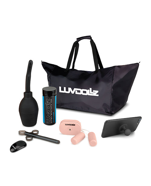 All of the accessories that come with the Luvdollz Remote Control Doggy Style Pussy & Ass. It includes a cleaning douche, renewal powder, a lube shooter, a wireless remote, two bullet vibrators, a phone stand, and a nylon ballistic storage bag. | Kinkly Shop