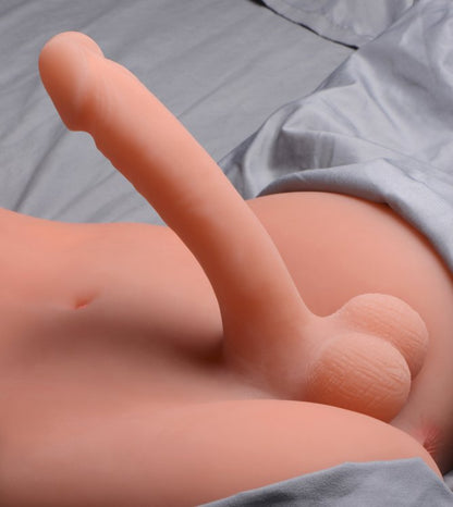 Close-up of the shaft protruding from the Transgender Terri Love Doll. It's really long and firm and holds its shape away from the sex doll. | Kinkly Shop