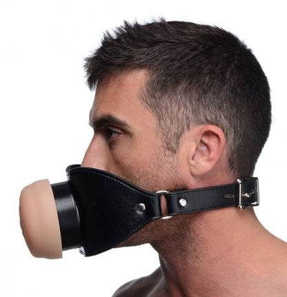 A person wears the Master Series Pussy Face. The Master Series Pussy Face gag protrudes very far away from their lips and mouth. | Kinkly Shop