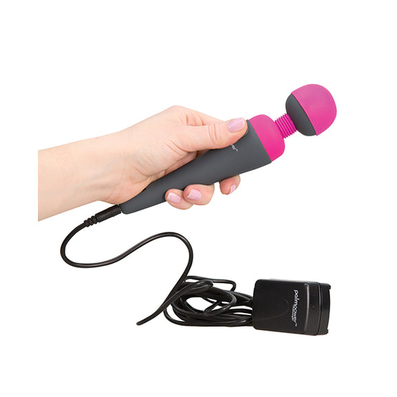 A hand holds the Palm Power Massager. The massager fits comfortably in their hands, much smaller than most wand massagers. | Kinkly Shop