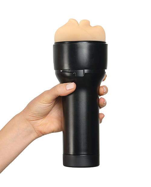 A hand holds the handle on the black case of the Kiiroo RealFeel Generic Mouth. The stroker looks comfortable and easy to hold in the hand. | Kinkly Shop