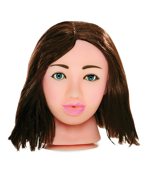 The Pipedream Fuck My Face brunette doll staring into the camera. The eyes look deep and detailed. | Kinkly Shop