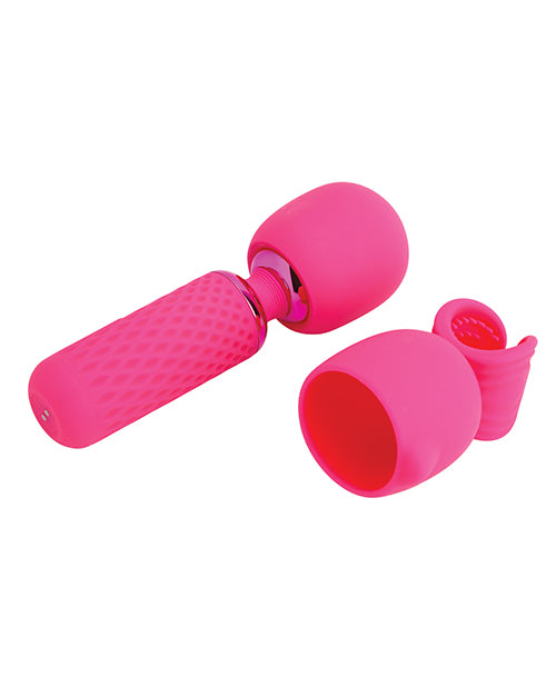 The Nubii: Harlow Mini in pink sitting out next to the optional attachment head that can be used with it. | Kinkly Shop