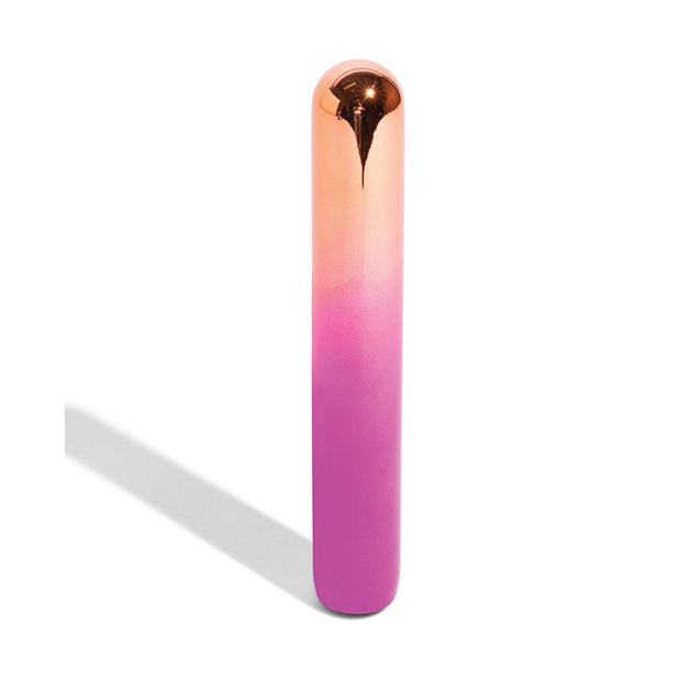 The ombre design of the Aluminum Rumba has an orange color near the rounded tip with an ombre blend that blends down into a pink near the bottom of the vibe. | Kinkly Shop
