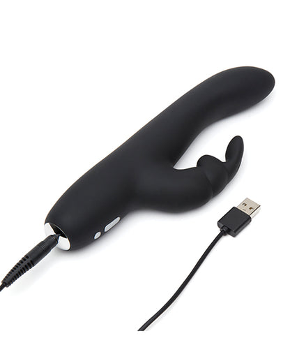 The charger for the Greedy Girl Rechargeable Slimline plugged into the base of the vibrator. It uses a pin charger that plugs into the toy itself. The other end of the charger has a USB port. | Kinkly Shop