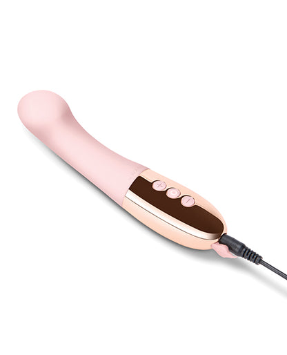 The Le Wand Gee vibrator plugged in to charge | Kinkly Shop