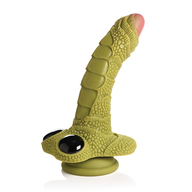 The suction cup base of the Creature Cocks Swamp Monster pressed against a flat surface, showcasing how thick and strong the suction cup is built to be. | Kinkly Shop
