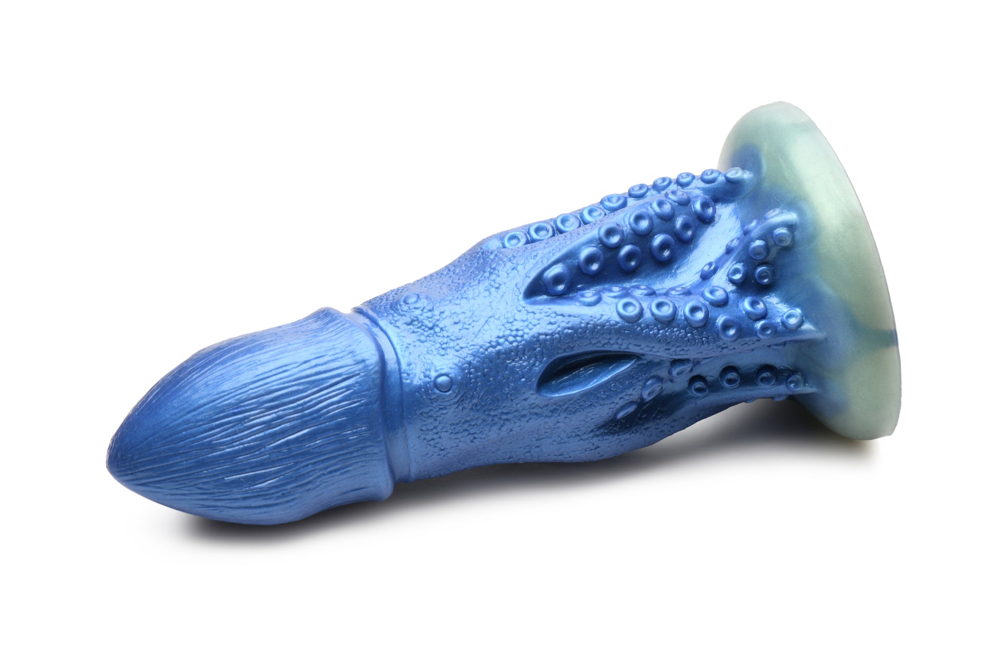 The Creature Cocks Cocktopus laying on its side. The octopuss itself is very textured. It even has an octopuss "skin" texture to it. | Kinkly Shop