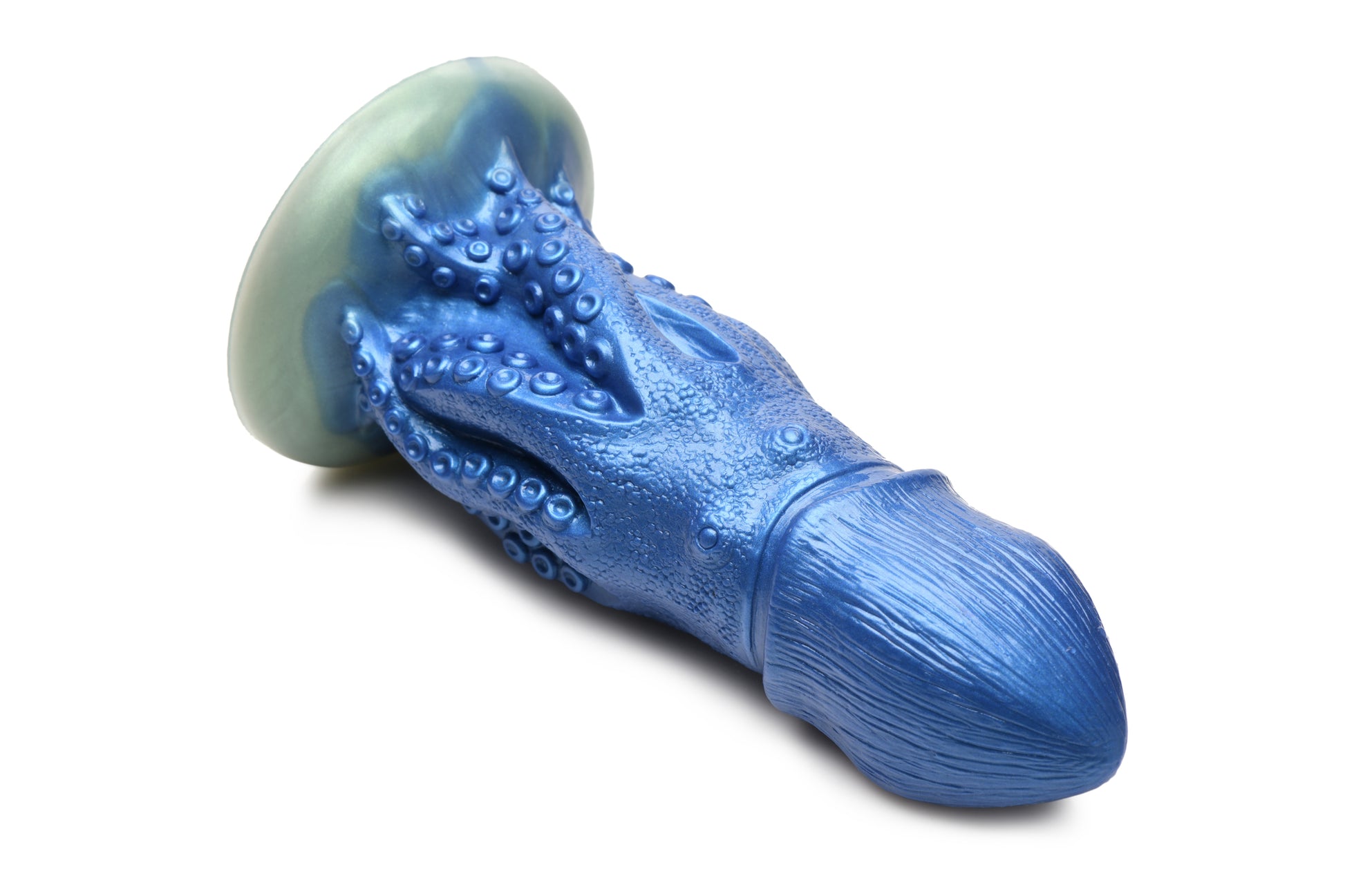 Close-up of the head of the Creature Cocks Cocktopus dildo. It is very tapered with lines all down the head. | Kinkly Shop