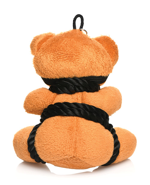 The back side of the Master Series Bound Teddy Bear Keychain, showcasing the soft ropes wrapped around its backside | Kinkly Shop