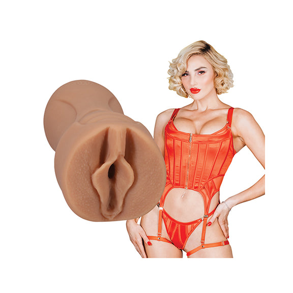 Kenzie shown next to the Signature Strokers - Kenzie Anne. The vulva orifice of the stroker is molded directly off of Kenzie's own vulva. | Kinkly Shop
