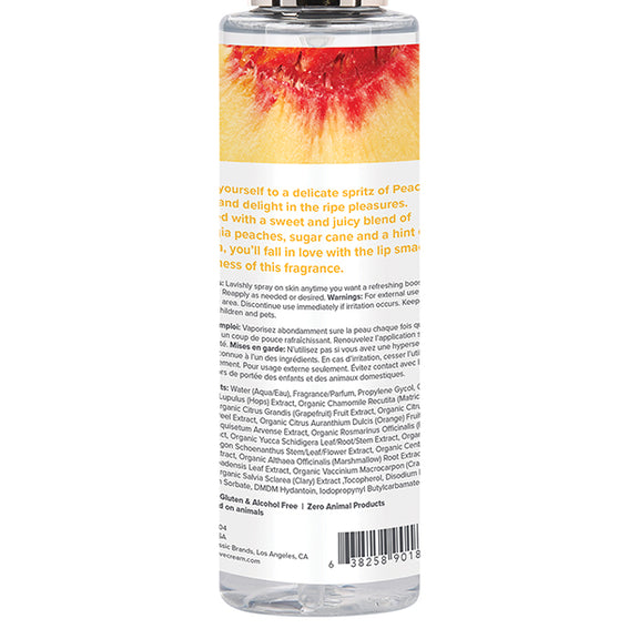 Close-up of the backside of the Coochy Fragrance Mist bottle. It has a lot of small text on it. | Kinkly Shop