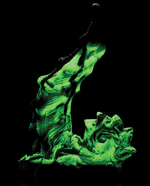 The Creature Cocks Glowzilla shown in the dark. All of the green, glow-in-the-dark color is very obvious with the lights out. | Kinkly Shop