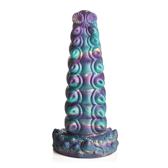 The Creature Cocks Chrysalis in front of a plain white background. The tip of the dildo looks like it's the caterpillar's eyeballs. | Kinkly Shop